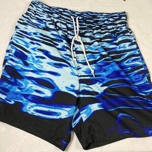 Joe Boxer Men’s Swim Trunks size Medium. (BE)